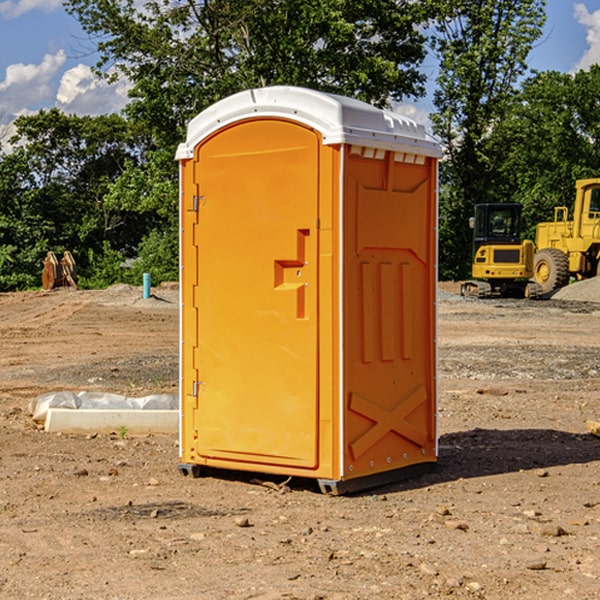 how often are the portable restrooms cleaned and serviced during a rental period in Madison County